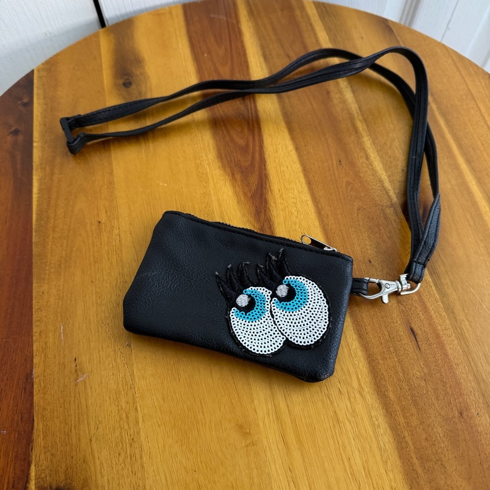 Claire’s‎ black faux leather eyes lashes crossbody